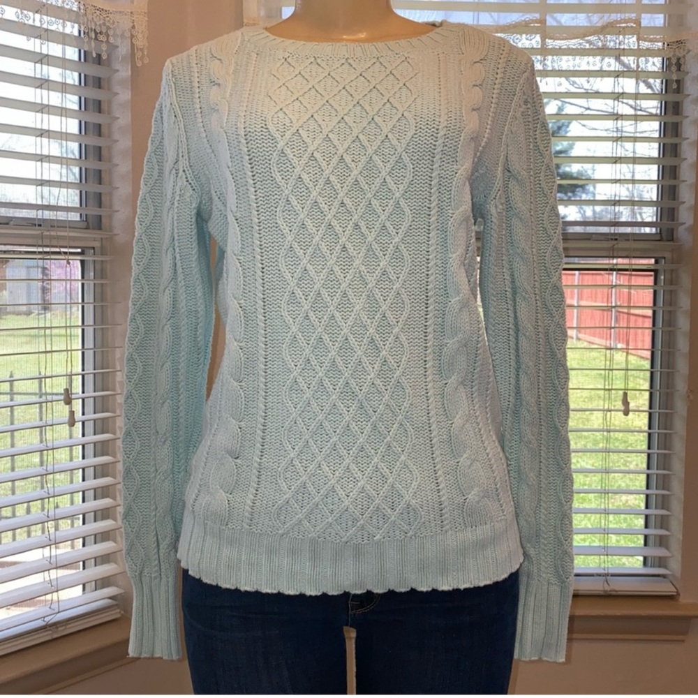 light green sweater